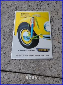 C. 1970s Original Vintage Monroe Shocks Sign Metal Embossed VW Beetle Gas Oil