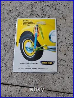 C. 1970s Original Vintage Monroe Shocks Sign Metal Embossed VW Beetle Gas Oil