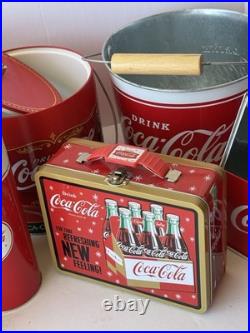 Collection of vintage-style Coca-Cola branded kitchenware, novelty collectibles