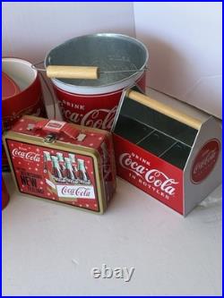 Collection of vintage-style Coca-Cola branded kitchenware, novelty collectibles