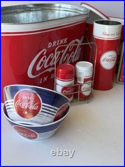 Collection of vintage-style Coca-Cola branded kitchenware, novelty collectibles