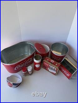 Collection of vintage-style Coca-Cola branded kitchenware, novelty collectibles