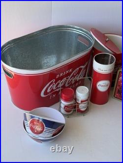 Collection of vintage-style Coca-Cola branded kitchenware, novelty collectibles