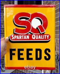 Colorful ORIGINAL EMBOSSED vintage SQ Spartan Quality Feeds ADVERTISING SIGN Colorful ORIGINAL EMBOSSED vintage SQ Spartan Quality Feeds ADVERTISING SIGN