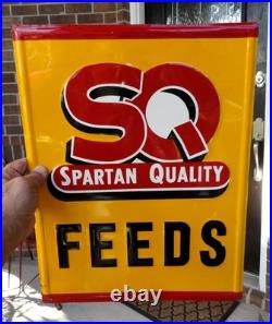 Colorful ORIGINAL EMBOSSED vintage SQ Spartan Quality Feeds ADVERTISING SIGN Colorful ORIGINAL EMBOSSED vintage SQ Spartan Quality Feeds ADVERTISING SIGN