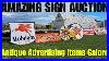 Searching-For-Deals-At-An-Estate-Auction-Full-Of-Vintage-Advertising-Signs-01-tnr
