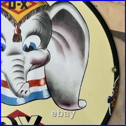 Vintage 1940 DX Lubricating Motor Fuel Dumbo 12 Inch Porcelain Enamel Sign