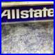 Vintage-Allstate-Light-Up-Can-Sign-Hung-On-Side-Of-Building-01-pyc