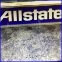 Vintage Allstate Light Up Can Sign Hung On Side Of Building