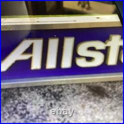 Vintage Allstate Light Up Can Sign Hung On Side Of Building