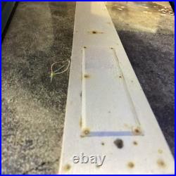 Vintage Allstate Light Up Can Sign Hung On Side Of Building