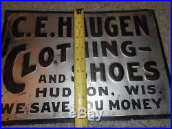 Vintage CE Haugen Clothing Shoes STORE Advertising Embossed tin SIGN HUDSON WI