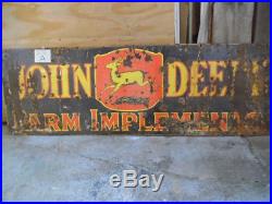 Vintage John Deere advertising sign