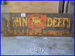 Vintage John Deere advertising sign