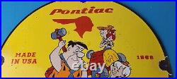 Vintage Pontiac Automobiles Sign Flintstones Cave Man Porcelain Gas Pump Sign