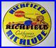 Vintage-Richfield-Richlube-Sign-California-s-Finest-Pinup-Girl-Gas-Pump-Sign-01-crex