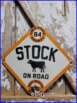 Vintage Rocky Mountain Motorists Porcelain Sign Old Colorado Highway Cow Cattle