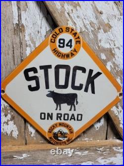 Vintage Rocky Mountain Motorists Porcelain Sign Old Colorado Highway Cow Cattle