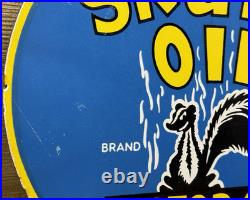Vintage Skunk Oil Porcelain Sign Heavy Duty Dealership Gas Station Motor Oil