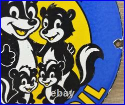 Vintage Skunk Oil Porcelain Sign Heavy Duty Dealership Gas Station Motor Oil