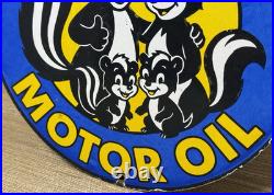 Vintage Skunk Oil Porcelain Sign Heavy Duty Dealership Gas Station Motor Oil