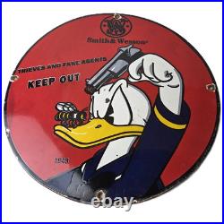 Vintage Smith & Wesson Porcelain Sign Donald Duck Ad Gas Pump Firearms Sign