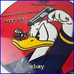 Vintage Smith & Wesson Porcelain Sign Donald Duck Ad Gas Pump Firearms Sign