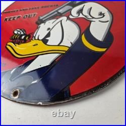 Vintage Smith & Wesson Porcelain Sign Donald Duck Ad Gas Pump Firearms Sign
