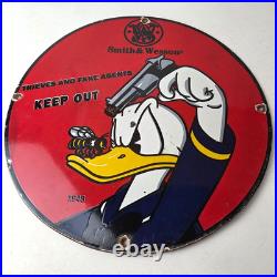 Vintage Smith & Wesson Porcelain Sign Donald Duck Ad Gas Pump Firearms Sign