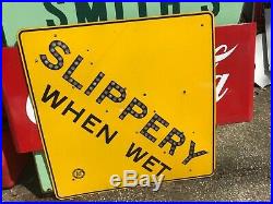 Vintage Southern California SLIPPERY WHEN WET Porcelain Sign Gloss Yellow