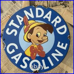 Vintage Standard Gasoline Pinocchio Walt Disney 12 Inch Porcelain Enamel Sign