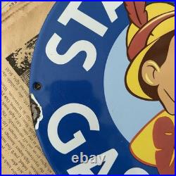 Vintage Standard Gasoline Pinocchio Walt Disney 12 Inch Porcelain Enamel Sign