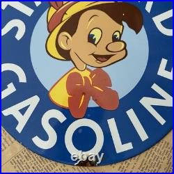 Vintage Standard Gasoline Pinocchio Walt Disney 12 Inch Porcelain Enamel Sign