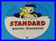 Vintage-Standard-Gasoline-Porcelain-Walt-Disney-Donald-Duck-Service-Station-Sign-01-wrm