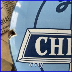 Vintage We Use Genuine Chevrolet Parts 12 Inch Convex Porcelain Enamel Sign