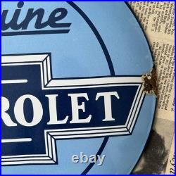 Vintage We Use Genuine Chevrolet Parts 12 Inch Convex Porcelain Enamel Sign