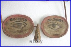 Vintage old Optometrist's advertisement / trade sign specs with wall bracket